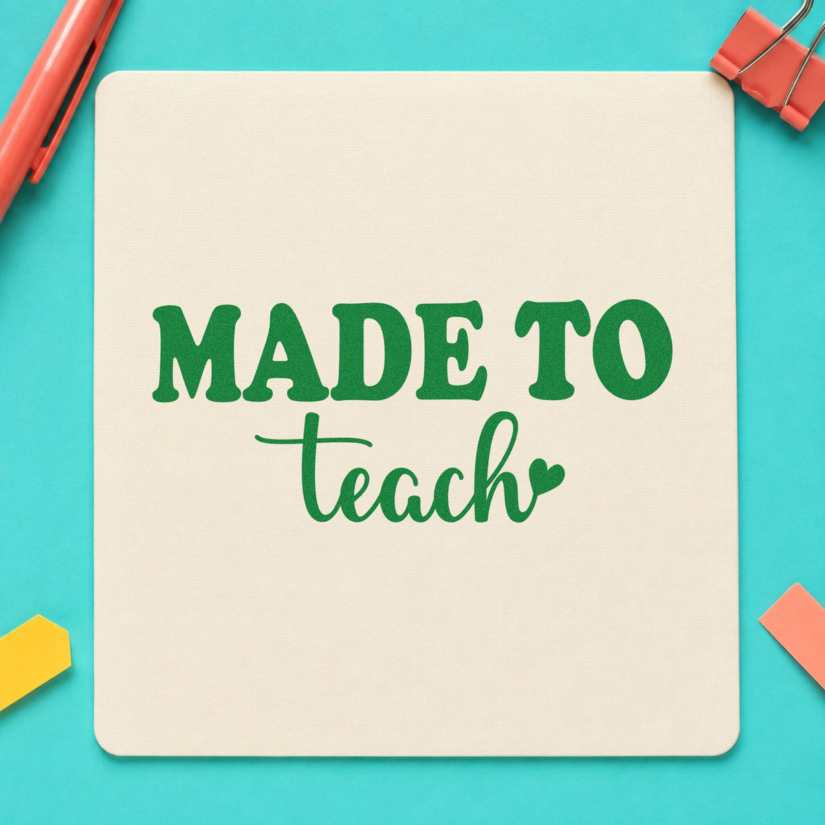 Made To Teach Heart craft stamp imprint in green ink on a handmade project, one idea being framed study desk.