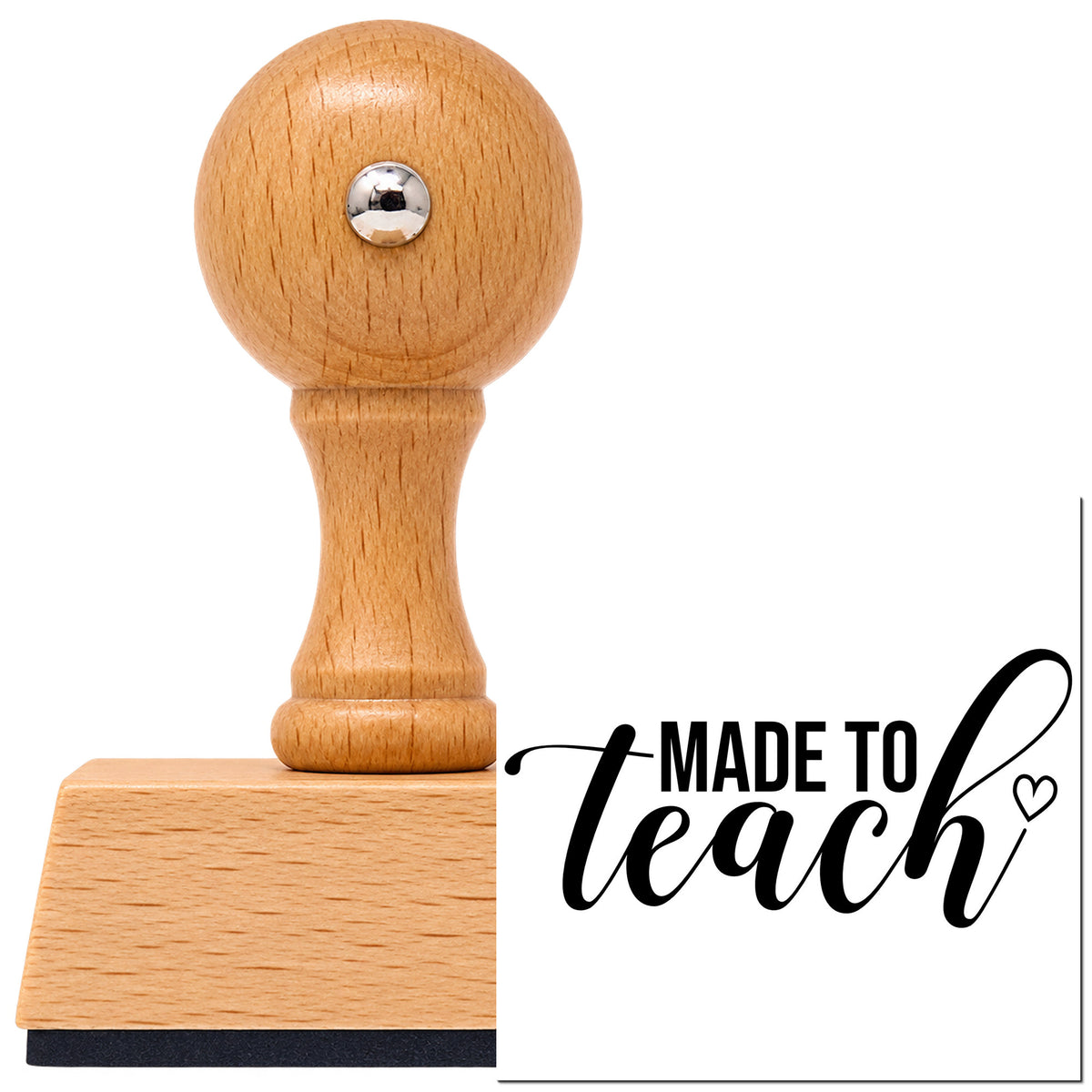Made To Teach Outline Heart Vintage Pro rubber stamp in European beech wood with a round knob handle, shown beside its black imprint.
