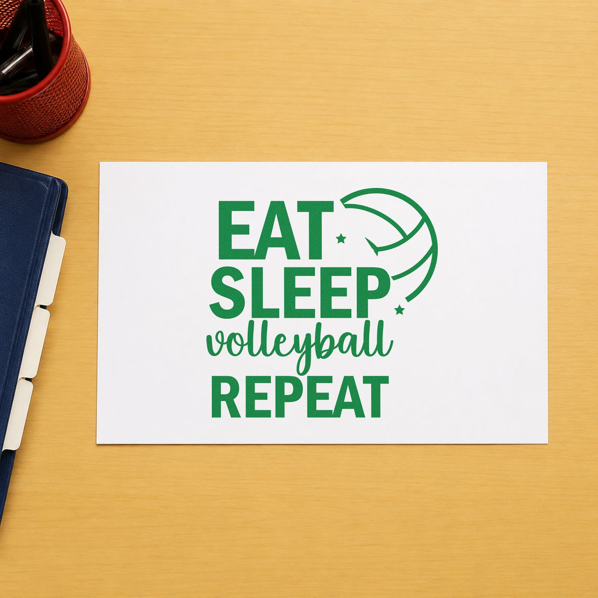 Eat Sleep Volleyball Repeat craft stamp imprint in green ink on a handmade project, one idea being practice log pages.