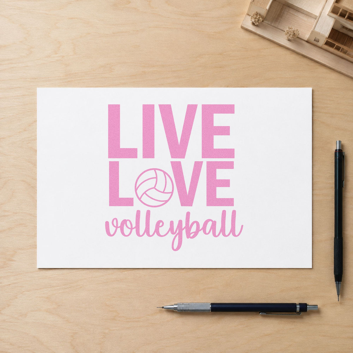 Live Love Volleyball craft stamp in purple ink on cardstock, an easy option for birthday party tags.
