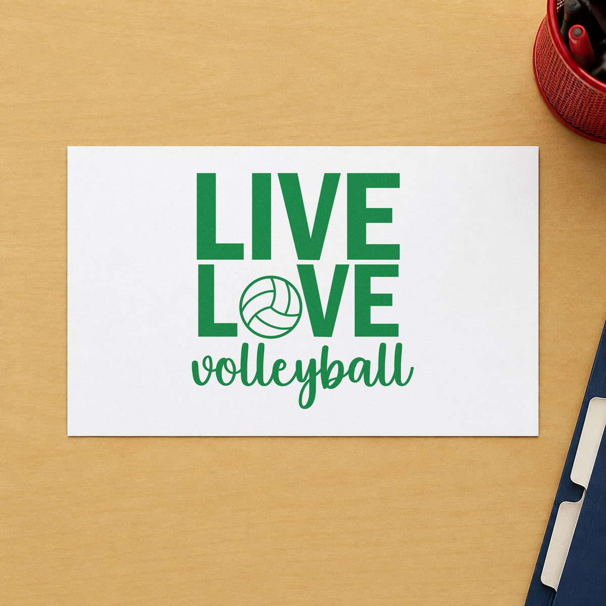Live Love Volleyball craft stamp imprint in green ink on a handmade project, one idea being party plan pages.