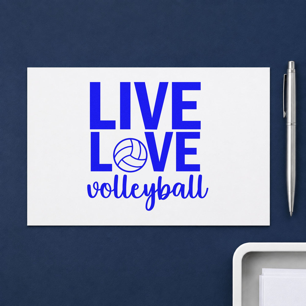 Live Love Volleyball craft stamp in blue ink on cardstock, an easy option for scrunchie band panels.