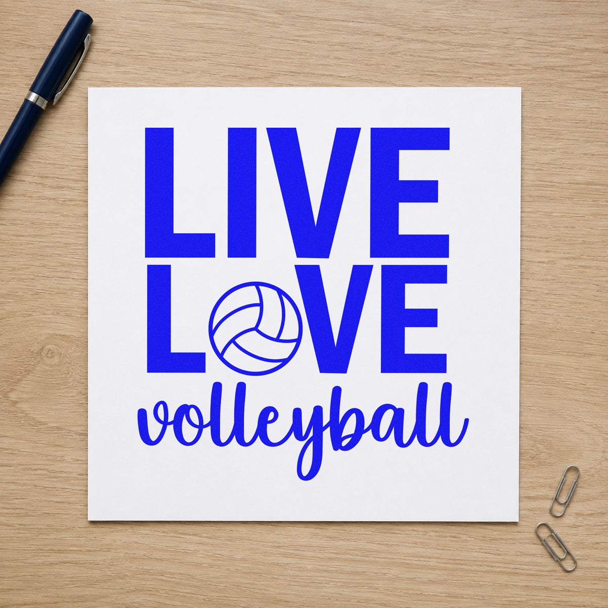 Live Love Volleyball craft stamp imprinted in blue ink on paper, a design suited to favor bag seals.