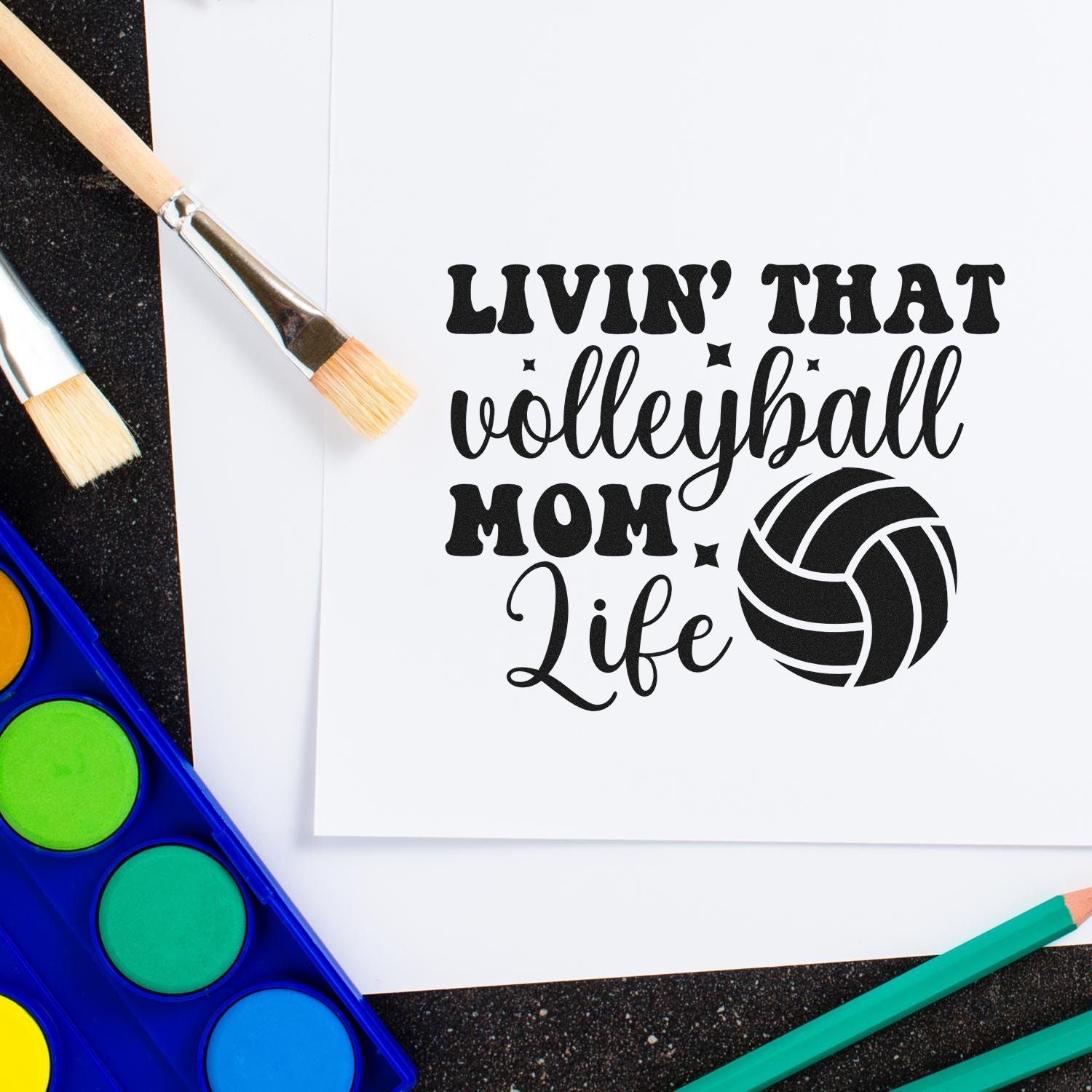 Volleyball mom rubber stamp design with Livin that volleyball mom life text and volleyball icon for DIY crafts.