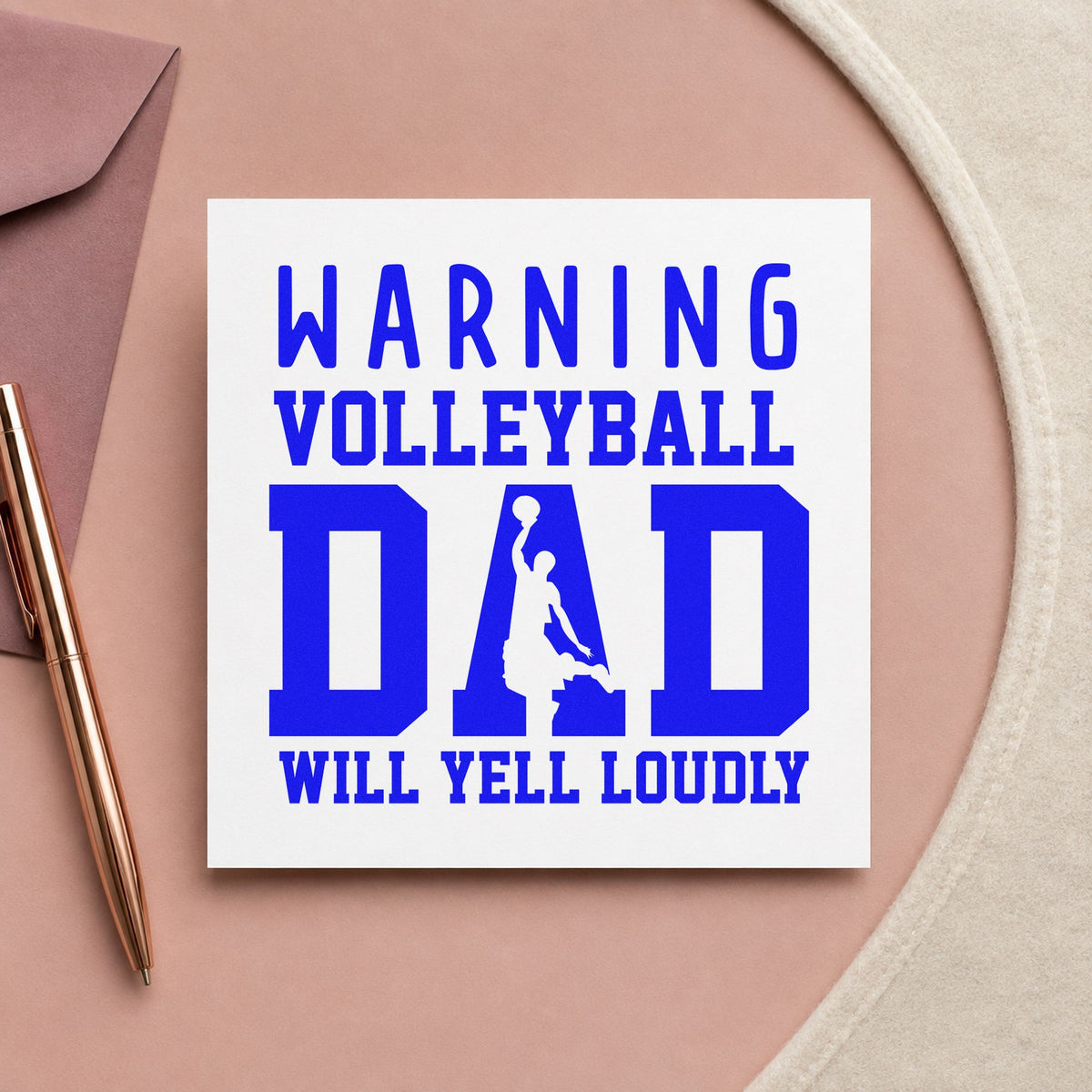 Warning Volleyball Dad Loud craft stamp imprinted in blue ink on paper, a design suited to stadium seat covers.