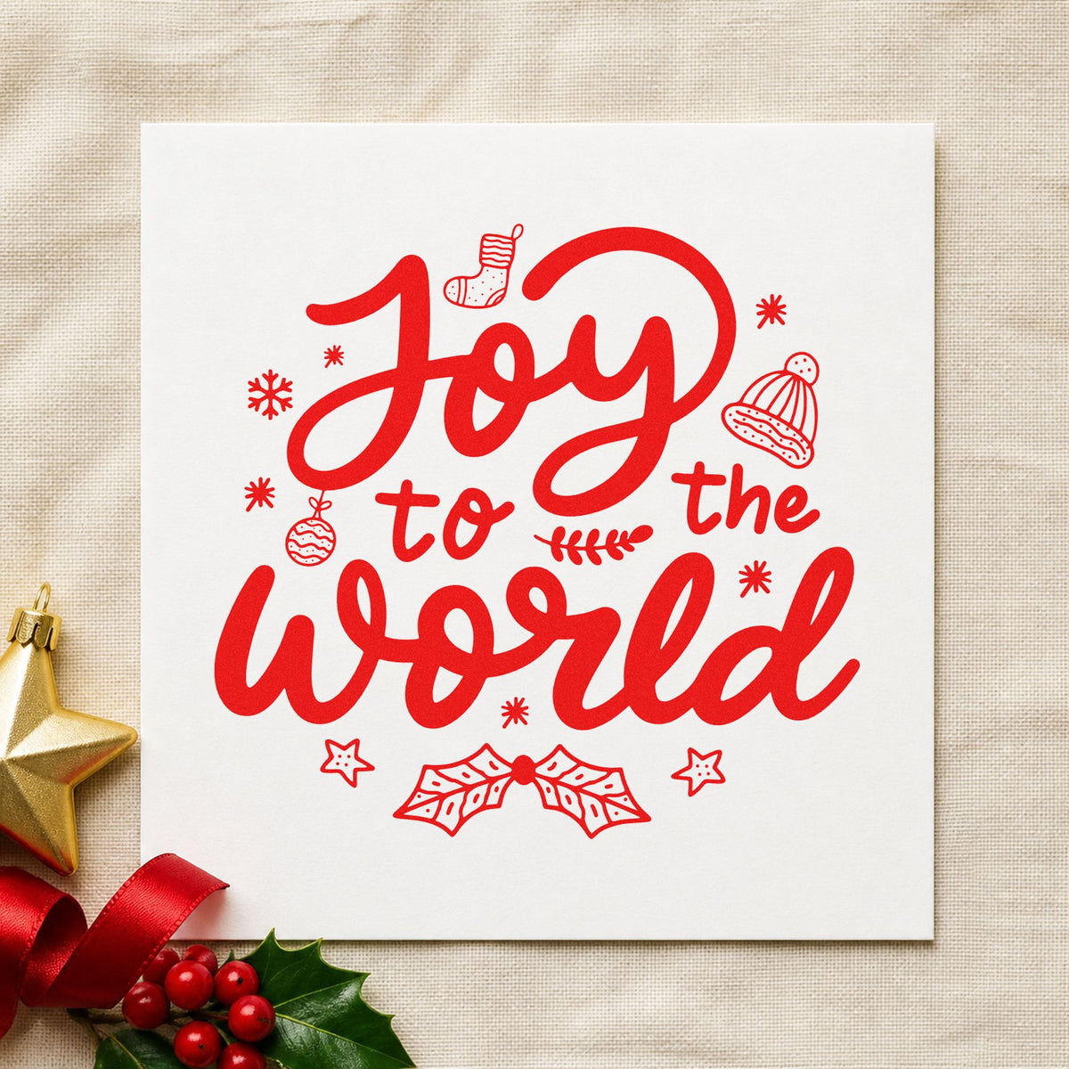 Joy To The World craft stamp in red ink on cardstock, an easy option for cookie tin labels.