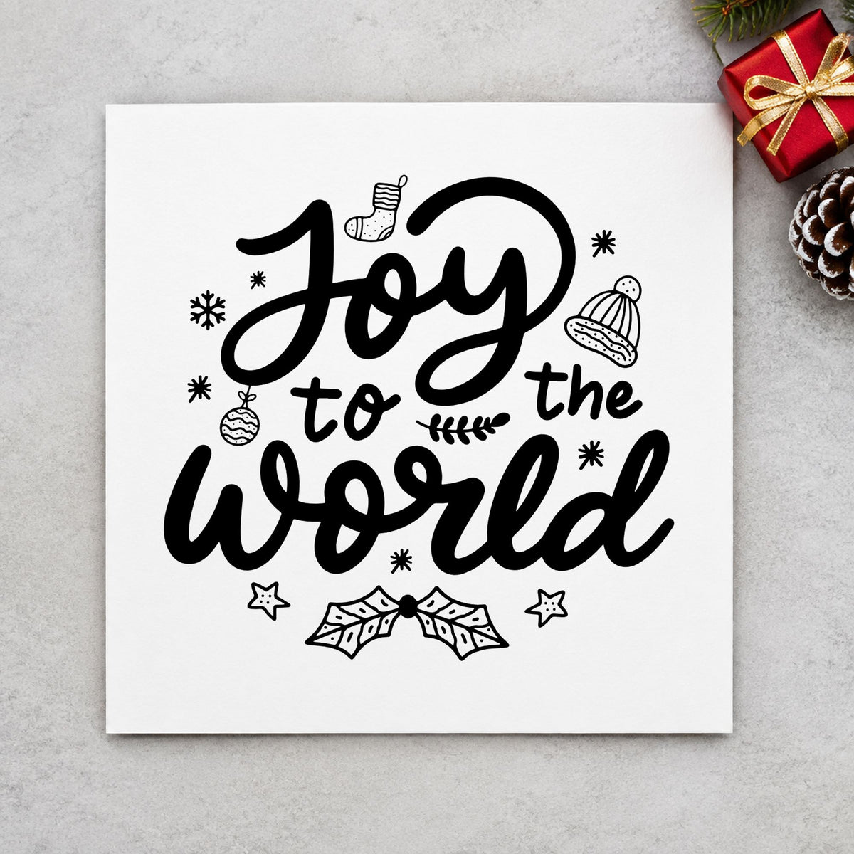 Joy To The World rubber stamp printed in black ink, ready for christmas card fronts and similar paper crafts.