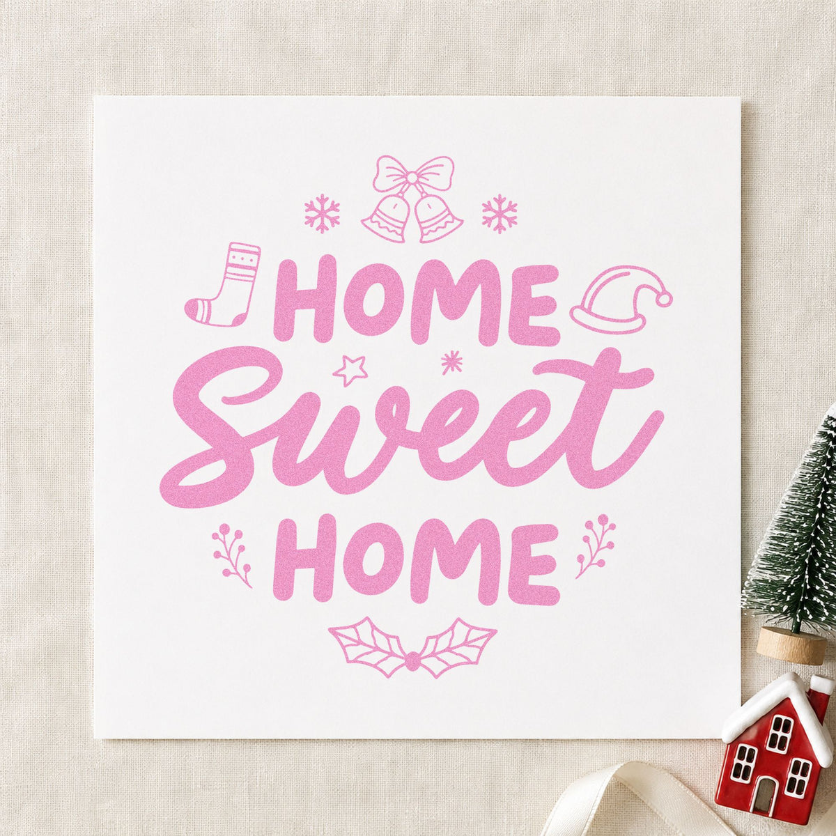 Home Sweet Home Christmas craft stamp in purple ink on cardstock, an easy option for housewarming tags.