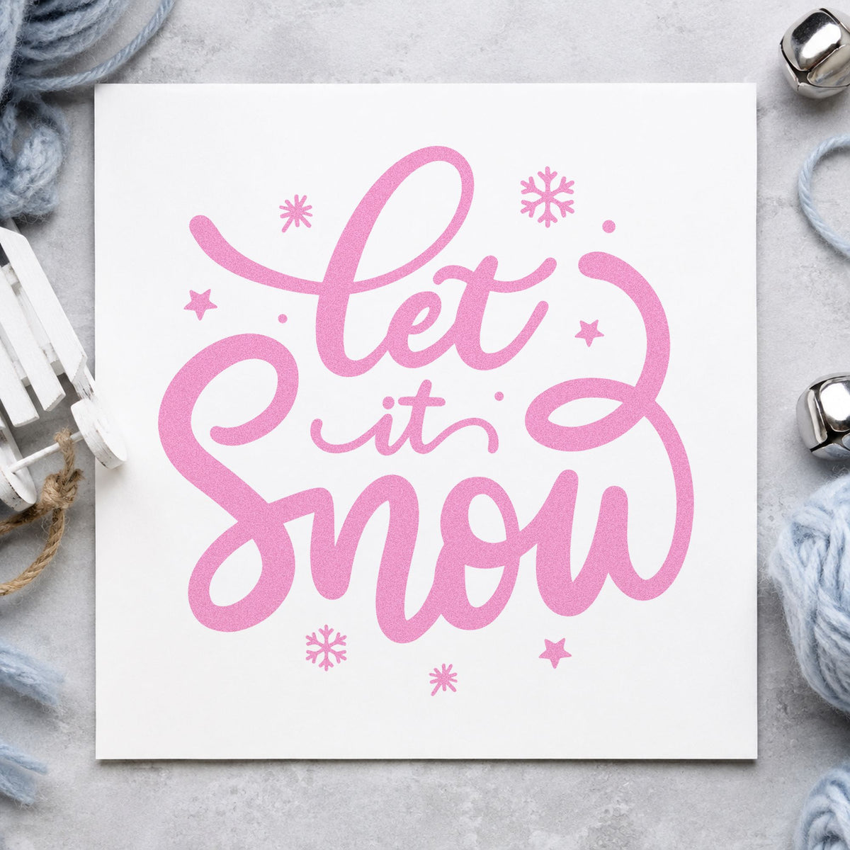 Let It Snow Script craft stamp in purple ink on cardstock, an easy option for snow day tags.