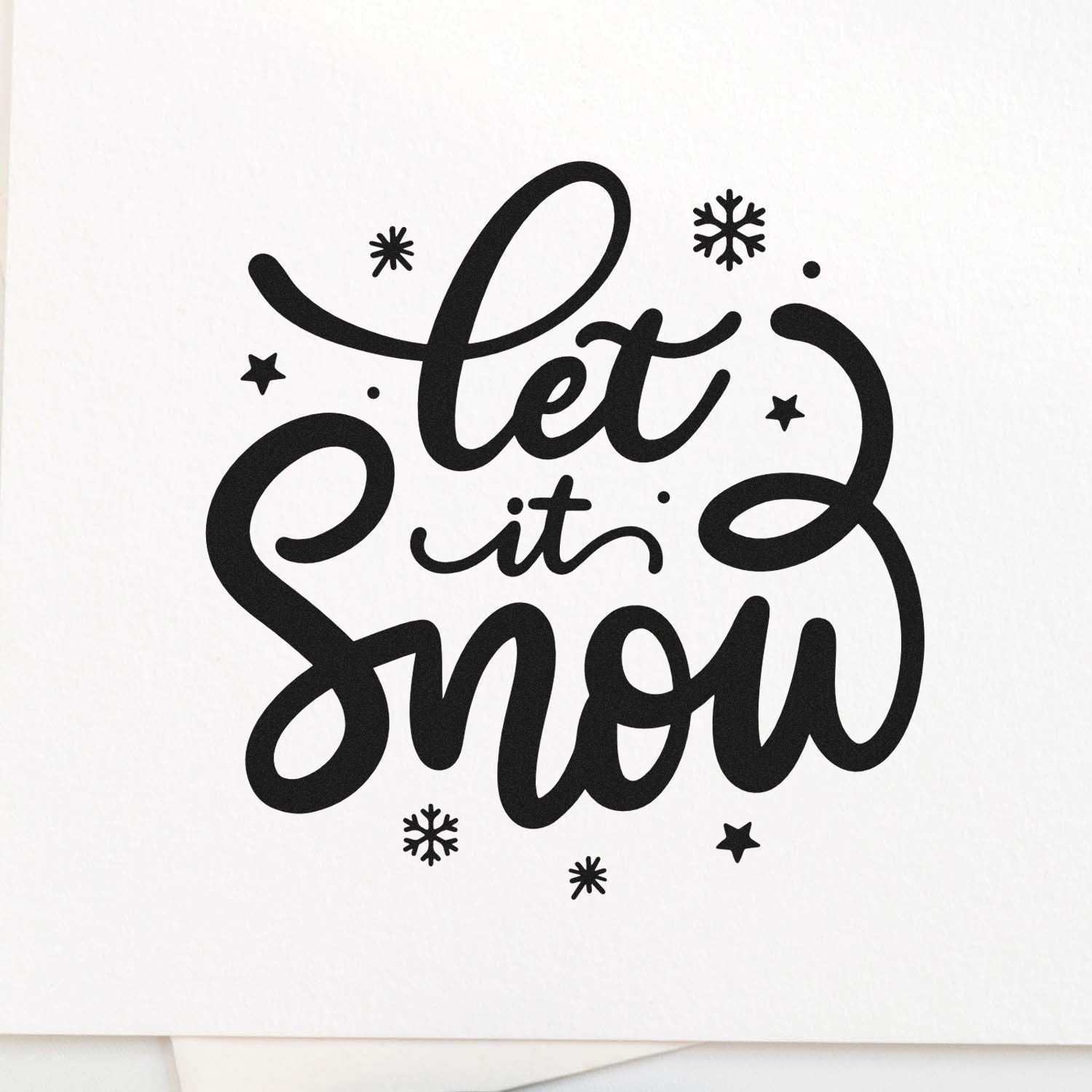 Let it Snow winter rubber stamp design with decorative snowflakes for holiday cards and crafts