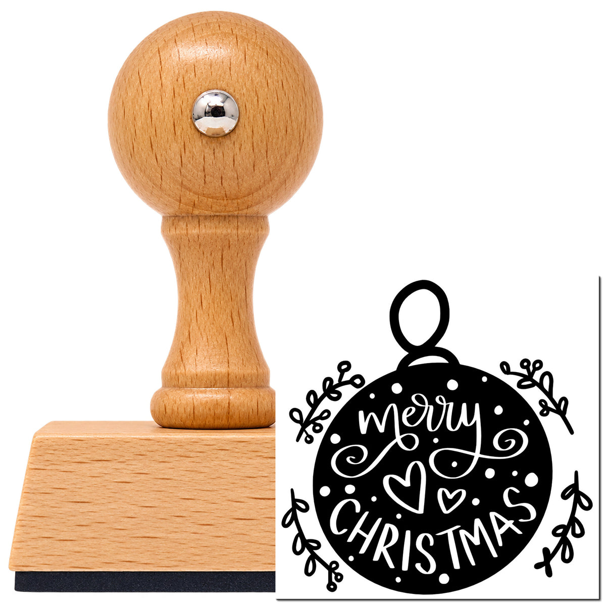 Merry Christmas Round Ornament Vintage Pro rubber stamp in European beech wood with a round knob handle, shown beside its black imprint.