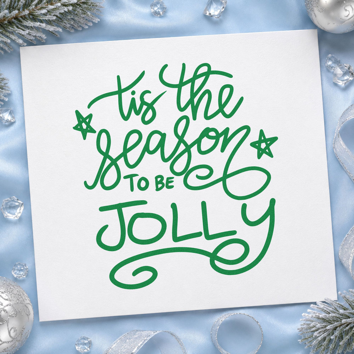 Tis The Season To Be Jolly craft stamp imprinted in green ink on paper, a design suited to take home seals.