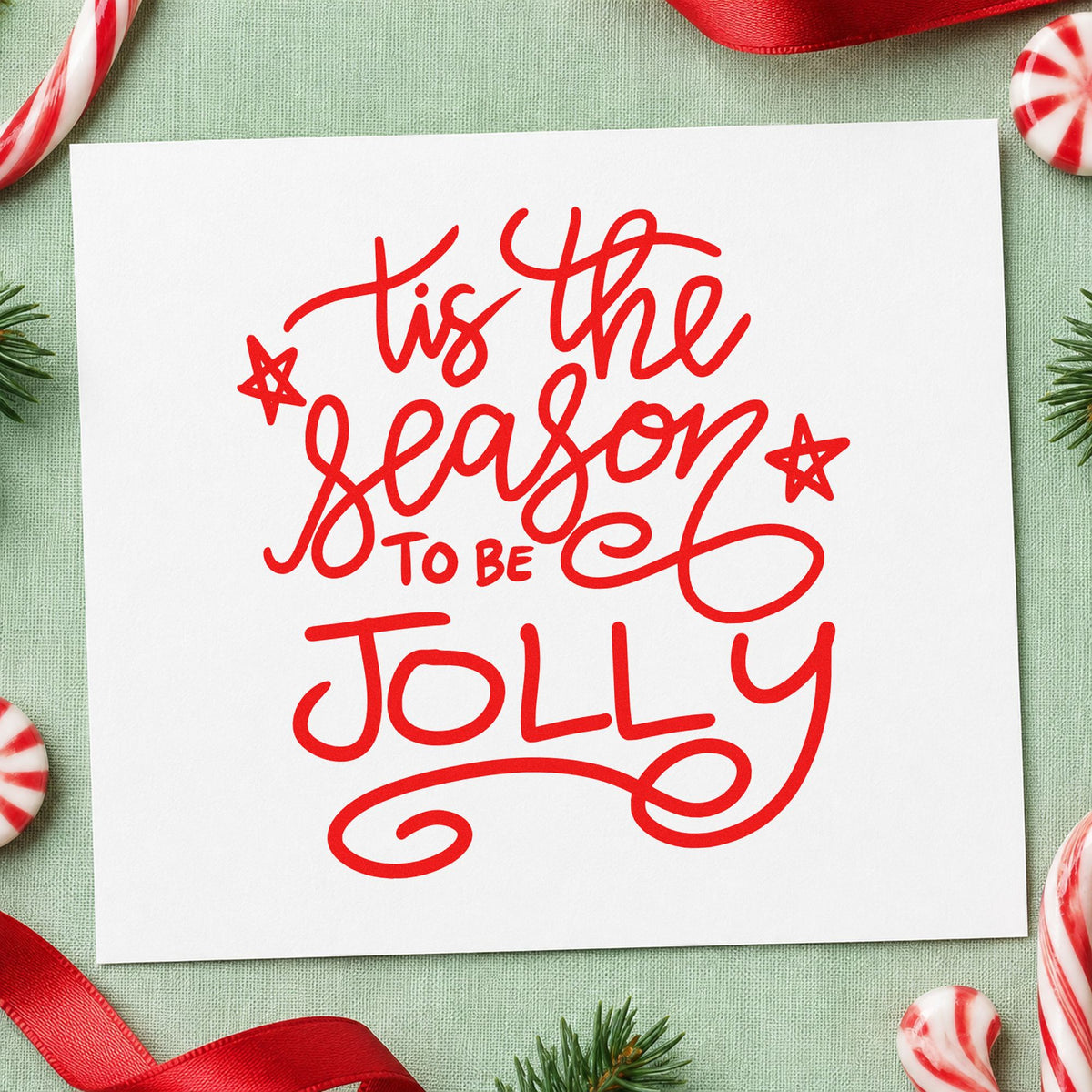 Tis The Season To Be Jolly rubber stamp shown in red ink, stamped for projects such as making day notes.