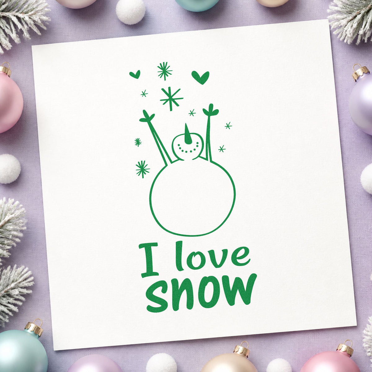 I Love Snow Snowman craft stamp imprinted in green ink on paper, a design suited to kit box seals.
