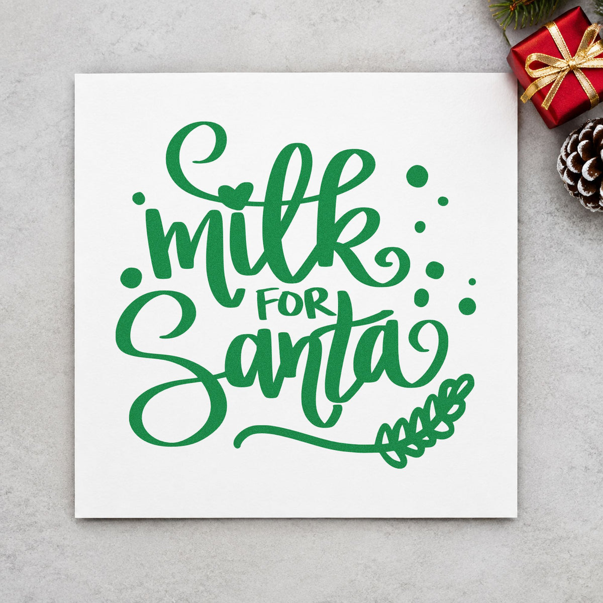 Milk For Santa craft stamp imprint in green ink on a handmade project, one idea being framed hearth ledge.
