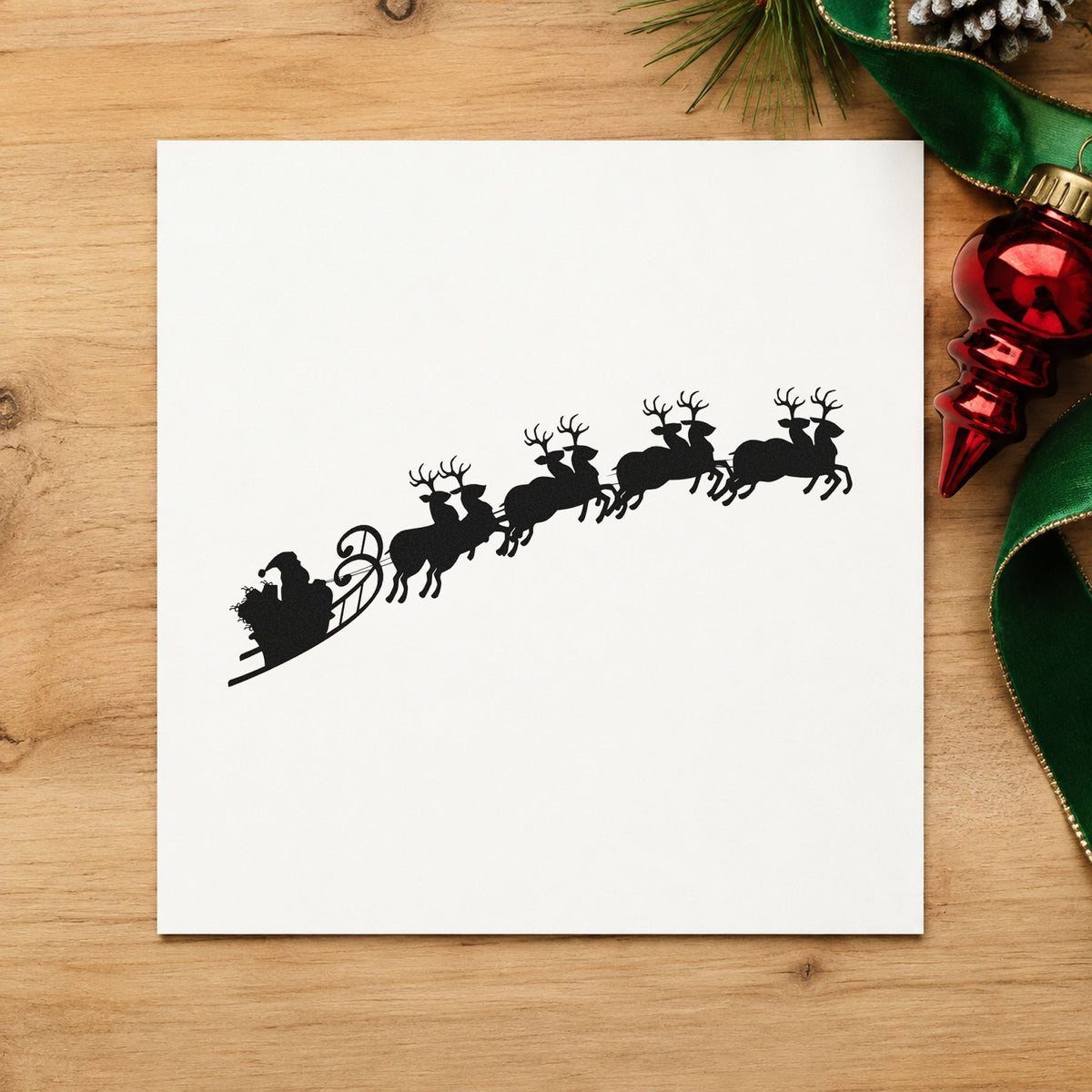 Santa Sleigh And Reindeer rubber stamp printed in black ink, ready for sleigh team cards and similar paper crafts.