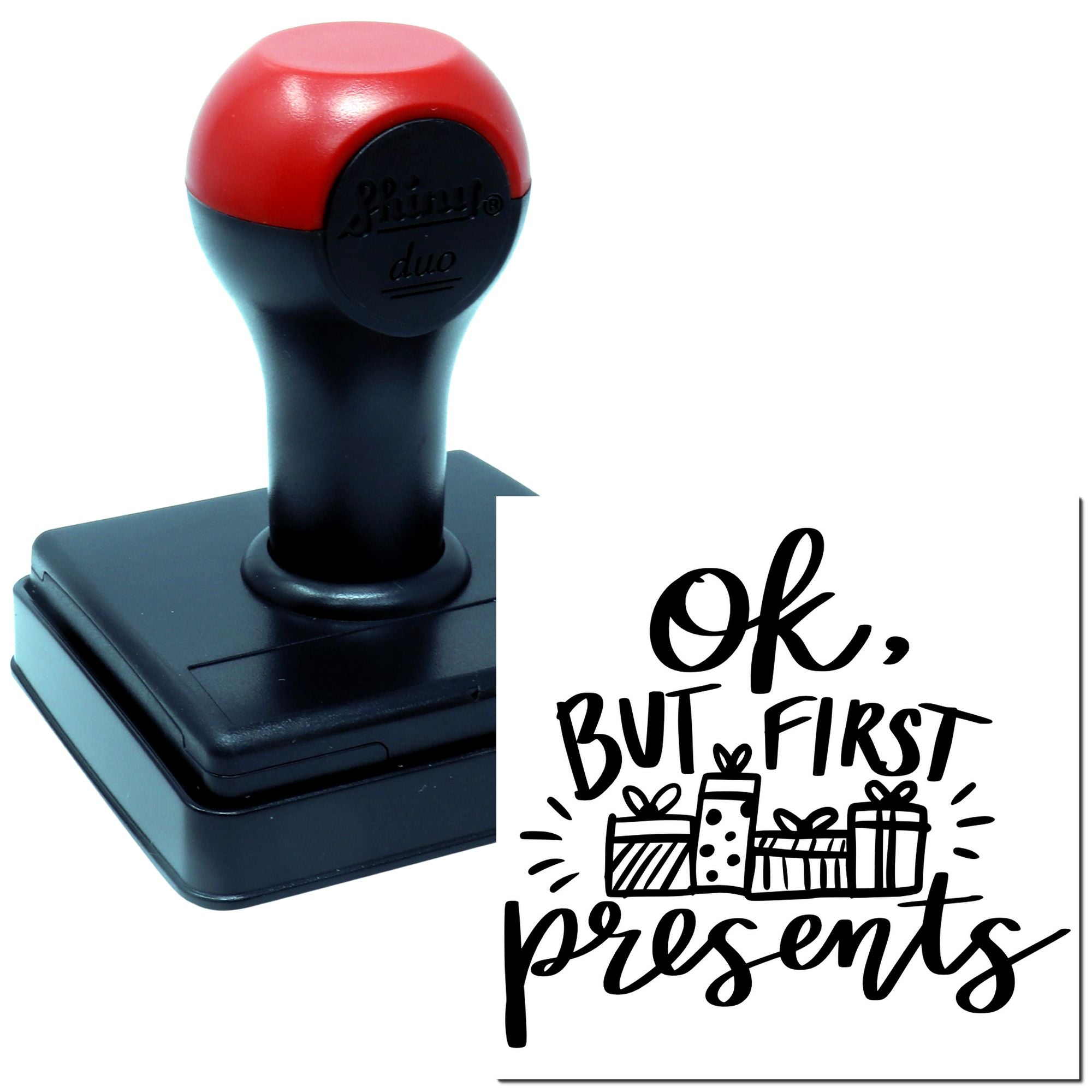 Custom rubber stamp with Ok, but first presents message and gift box graphic for holiday gift packaging.