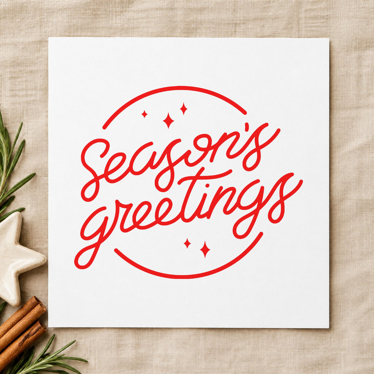Season's Greetings Circle craft stamp in red ink on cardstock, an easy option for ribbon band panels.