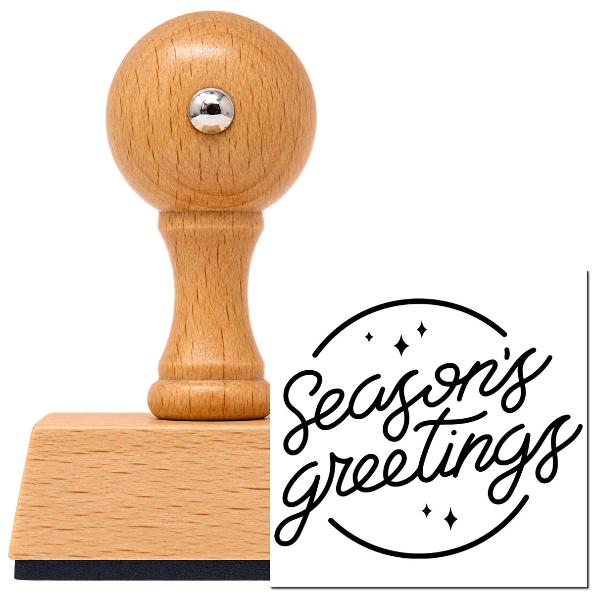 Season's Greetings Vintage Pro rubber stamp in European beech wood with a round knob handle, shown beside its black imprint.