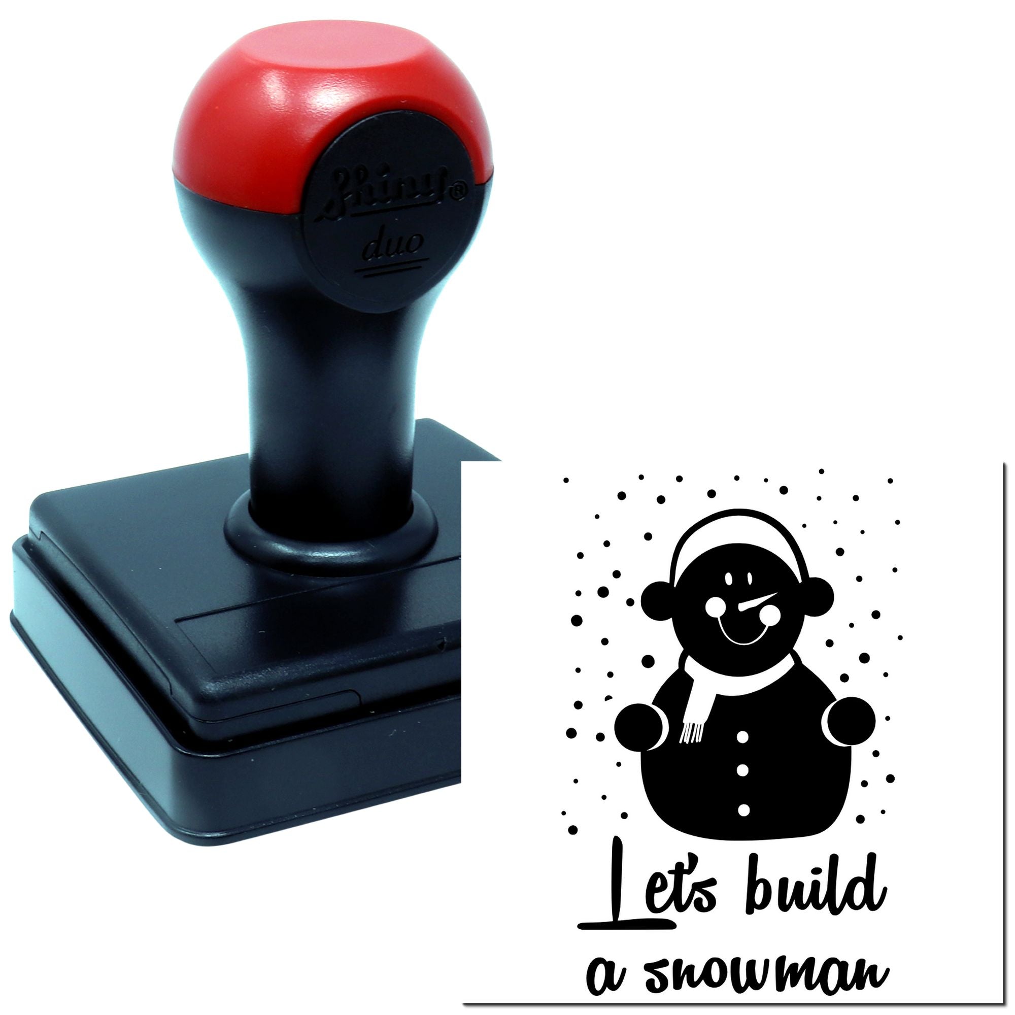 Self-inking rubber stamp with Lets Build a Snowman design for holiday cards, crafts, and winter-themed projects.