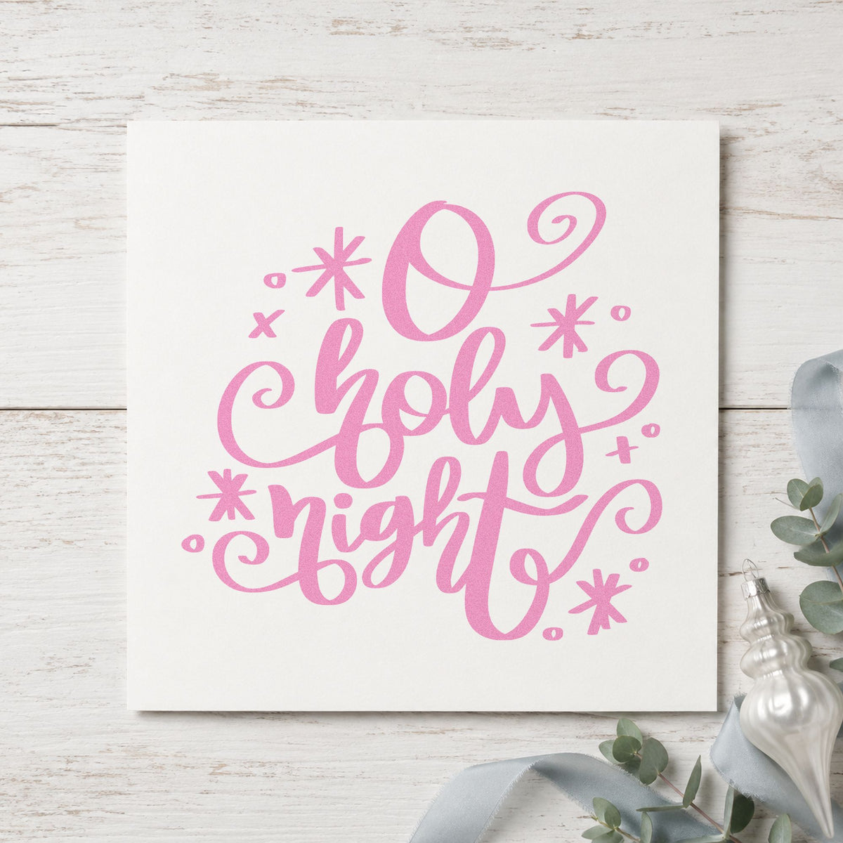 O Holy Night Flourishes craft stamp in purple ink on cardstock, an easy option for choir folder tags.