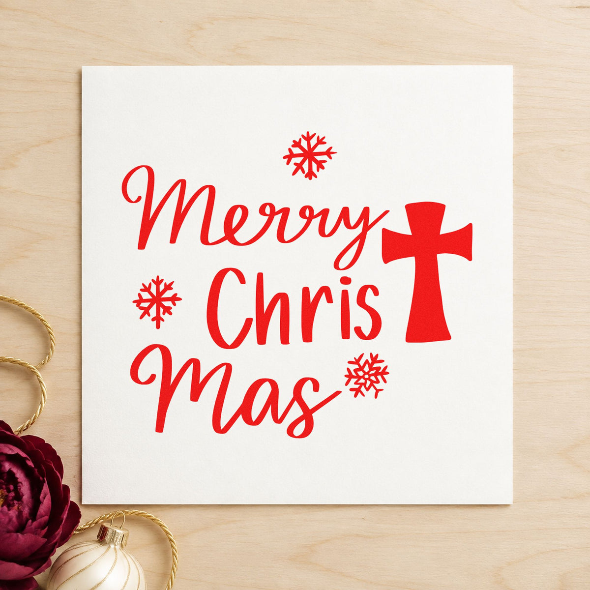 Merry Christmas Cross craft stamp in red ink on cardstock, an easy option for choir robe bags.