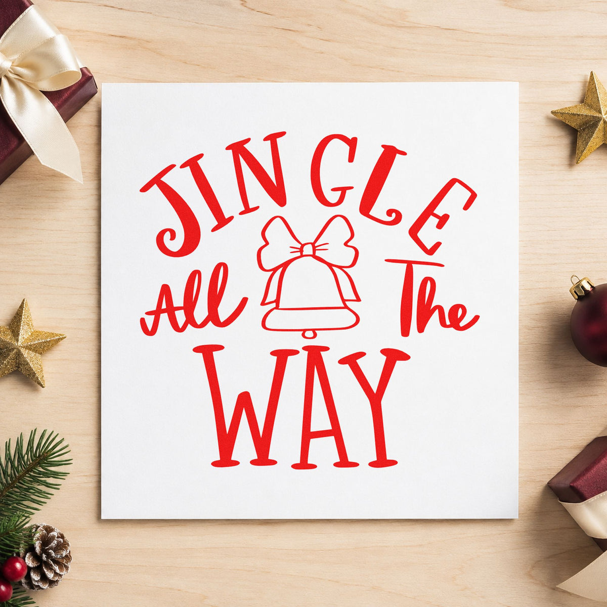 Jingle All The Way Bell rubber stamp shown in red ink, stamped for projects such as cocoa jar labels.