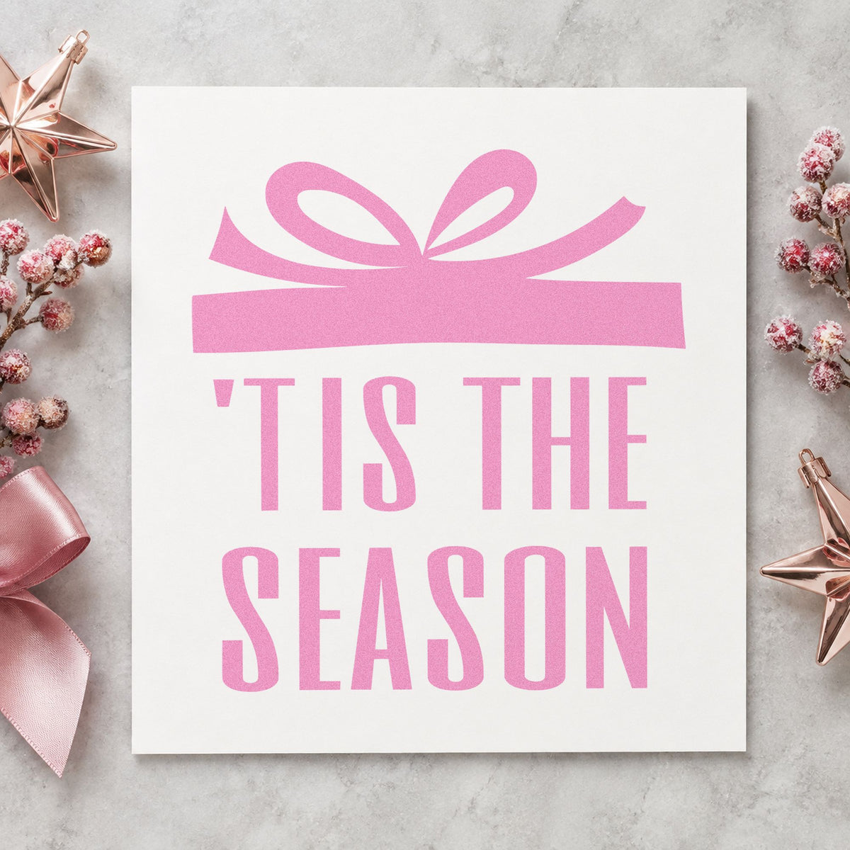 Tis The Season Gift craft stamp in purple ink on cardstock, an easy option for wrapping station kit.