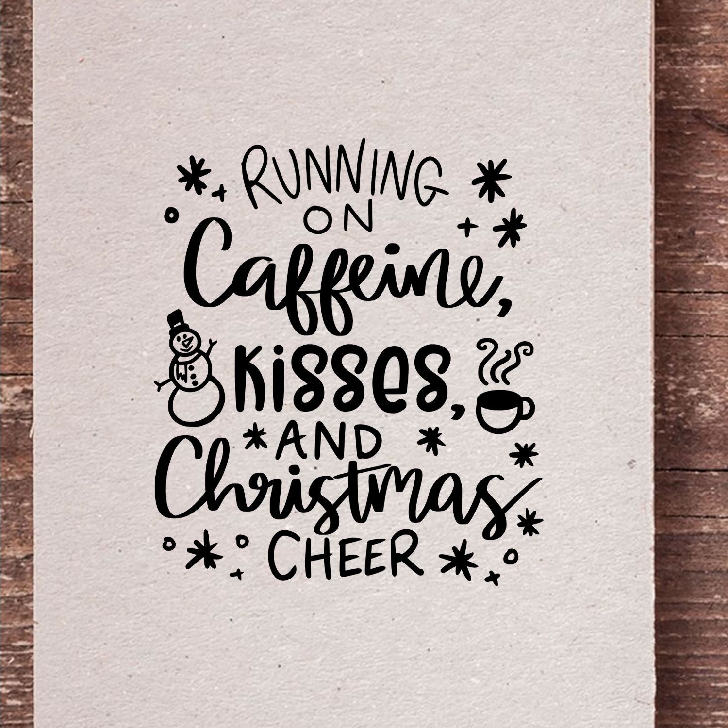 Christmas rubber stamp design with Running on Caffeine, Kisses, and Christmas Cheer, plus snowman and coffee cup.