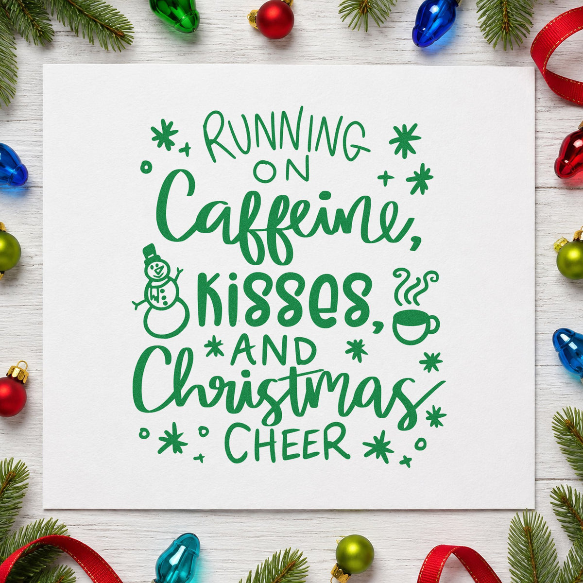 Caffeine Kisses Christmas Cheer craft stamp imprint in green ink on a handmade project, one idea being coffee bag toppers.