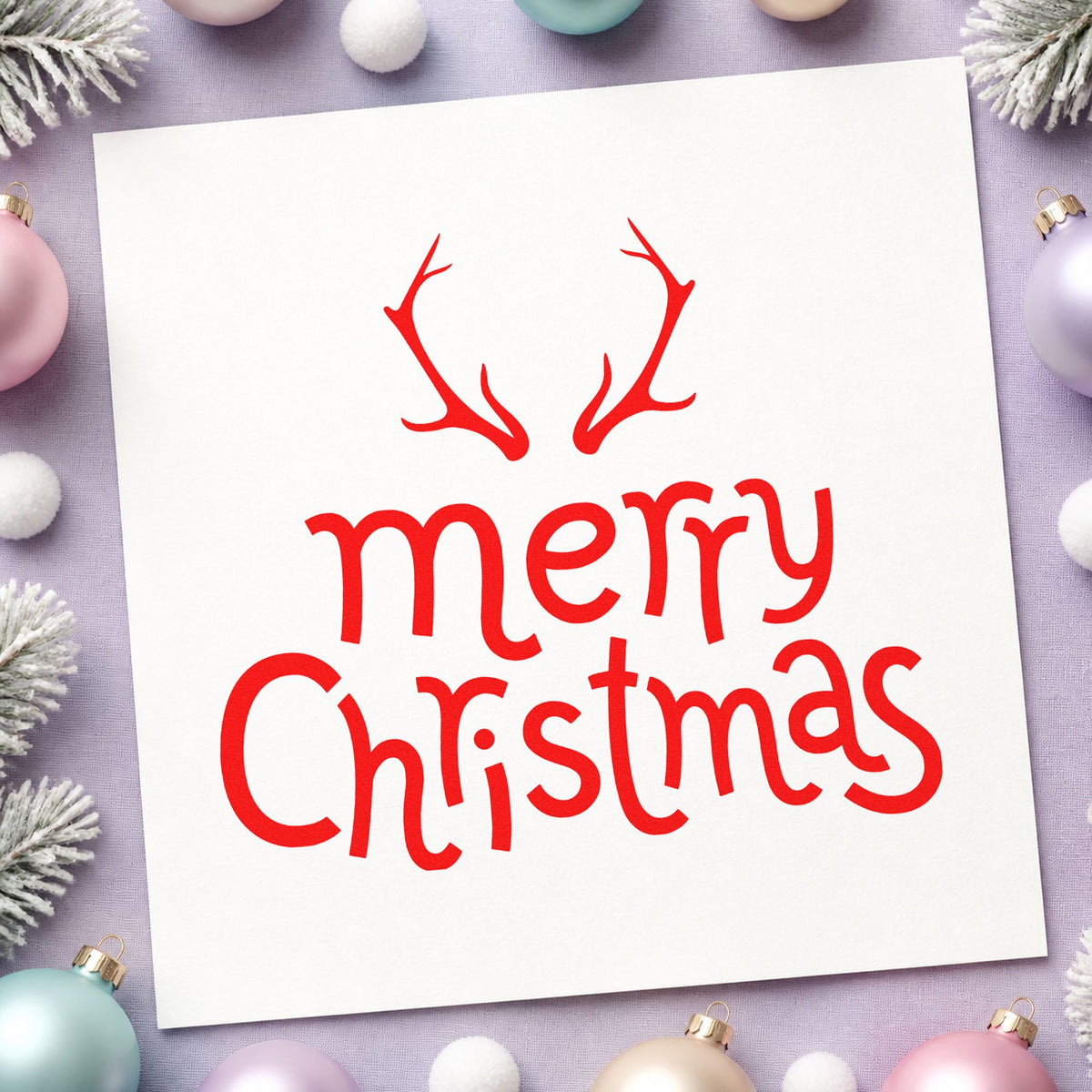 Merry Christmas Antlers craft stamp in red ink on cardstock, an easy option for flannel pillow ink.
