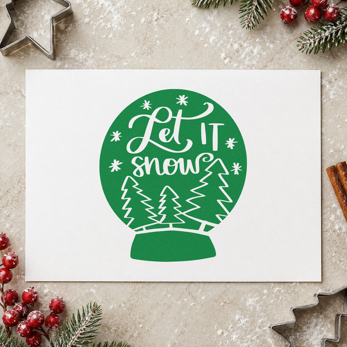 Let It Snow Snow Globe craft stamp imprint in green ink on a handmade project, one idea being mitten gift tags.