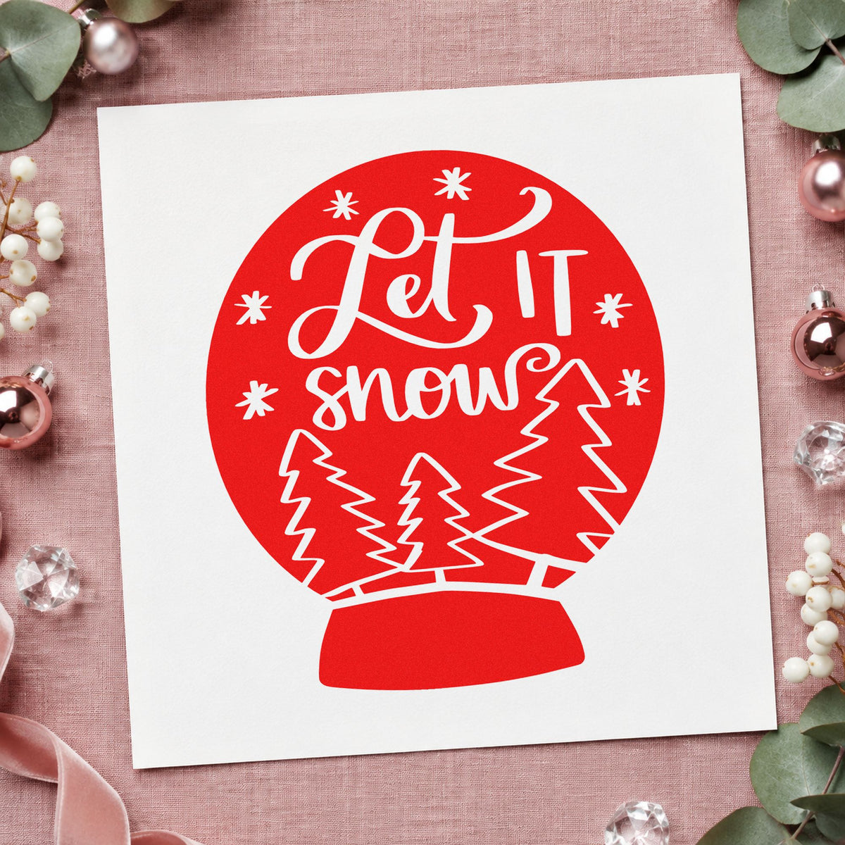 Let It Snow Snow Globe craft stamp in red ink on cardstock, an easy option for fleece blanket ink.