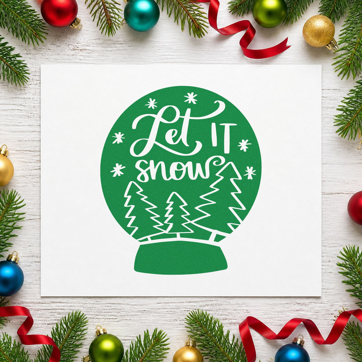 Let It Snow Snow Globe craft stamp imprint in green ink on a handmade project, one idea being sledding party passes.