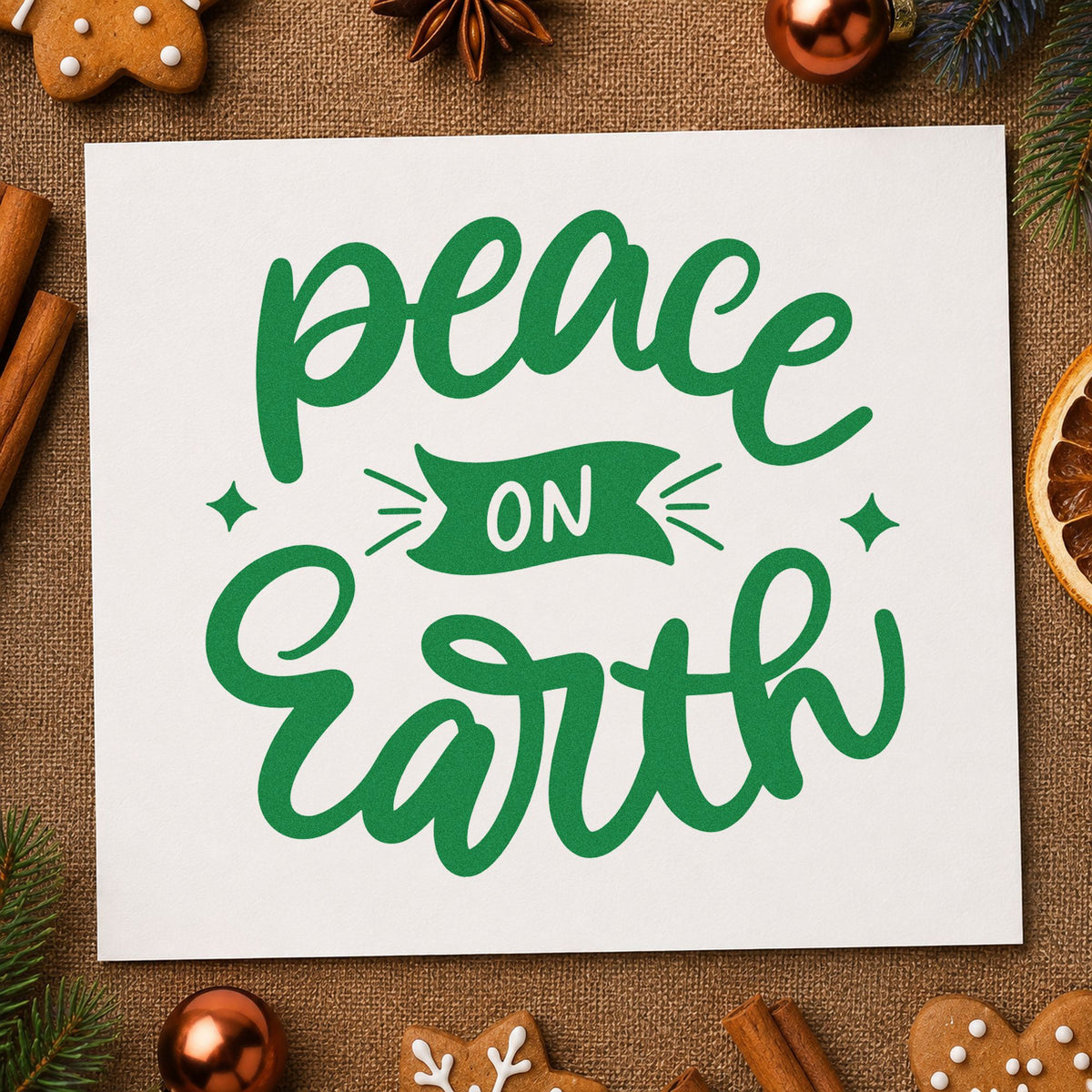 Peace On Earth Banner craft stamp imprint in green ink on a handmade project, one idea being charity drive tags.
