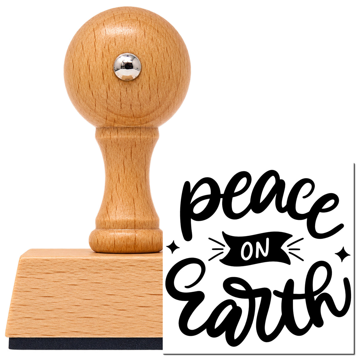 Peace On Earth Banner Vintage Pro rubber stamp in European beech wood with a round knob handle, shown beside its black imprint.