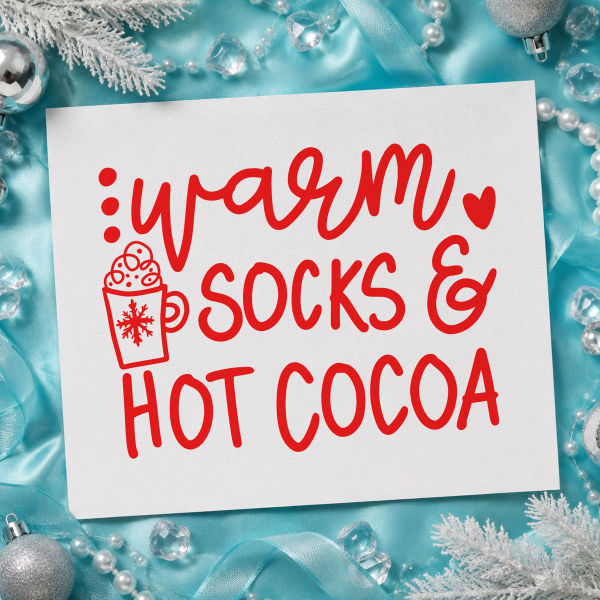 Warm Socks And Hot Cocoa craft stamp in red ink on cardstock, an easy option for throw pillow ink.