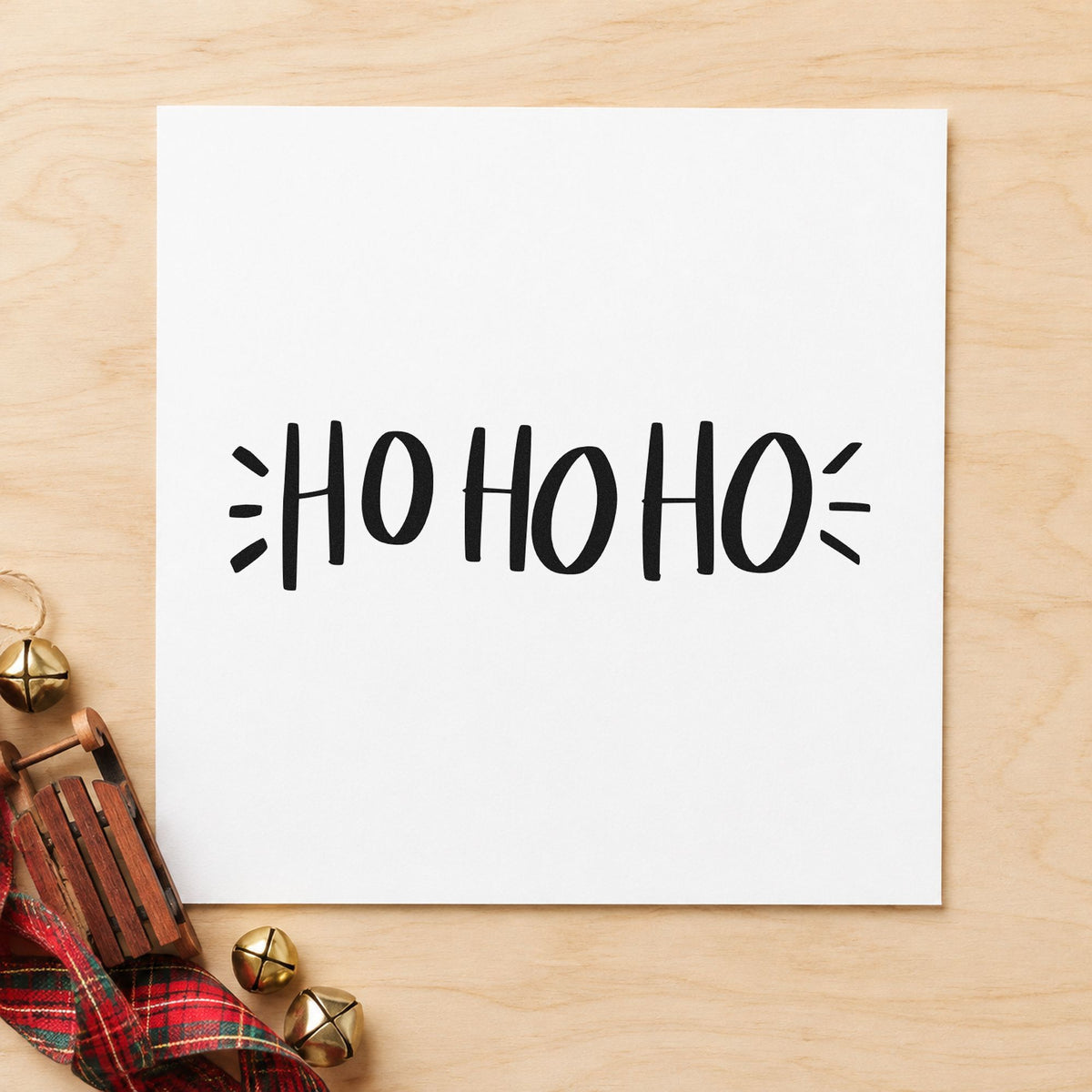 Ho Ho Ho Lettering rubber stamp printed in black ink, ready for santa laugh cards and similar paper crafts.