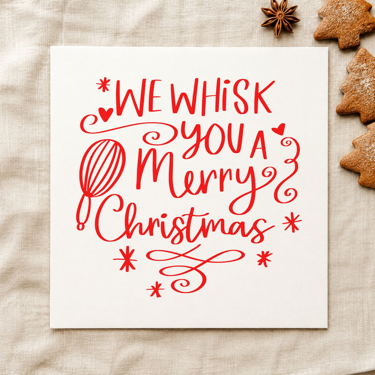 We Whisk Merry Christmas rubber stamp shown in red ink, stamped for projects such as jar ring seals.