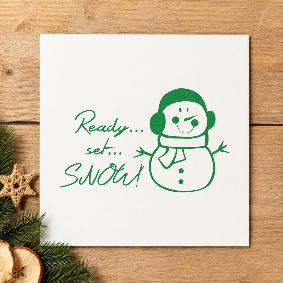 Ready Set Snow Snowman craft stamp imprinted in green ink on paper, a design suited to framed preschool wall.