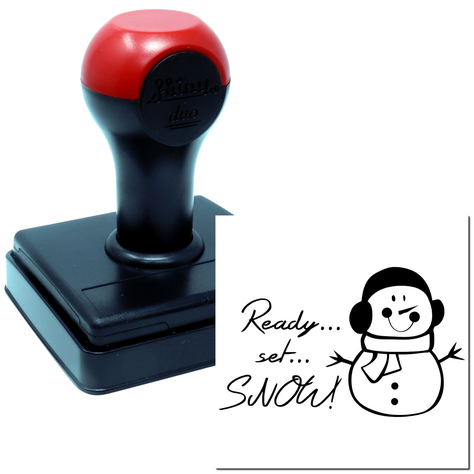 Self-inking rubber stamp with Ready, set, snow! snowman imprint for holiday cards, crafts, and seasonal packaging.