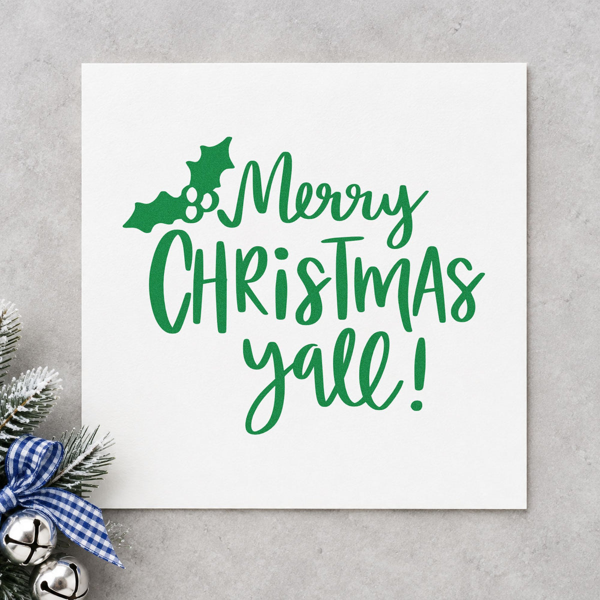 Merry Christmas Yall Holly craft stamp imprinted in green ink on paper, a design suited to framed screen porch.