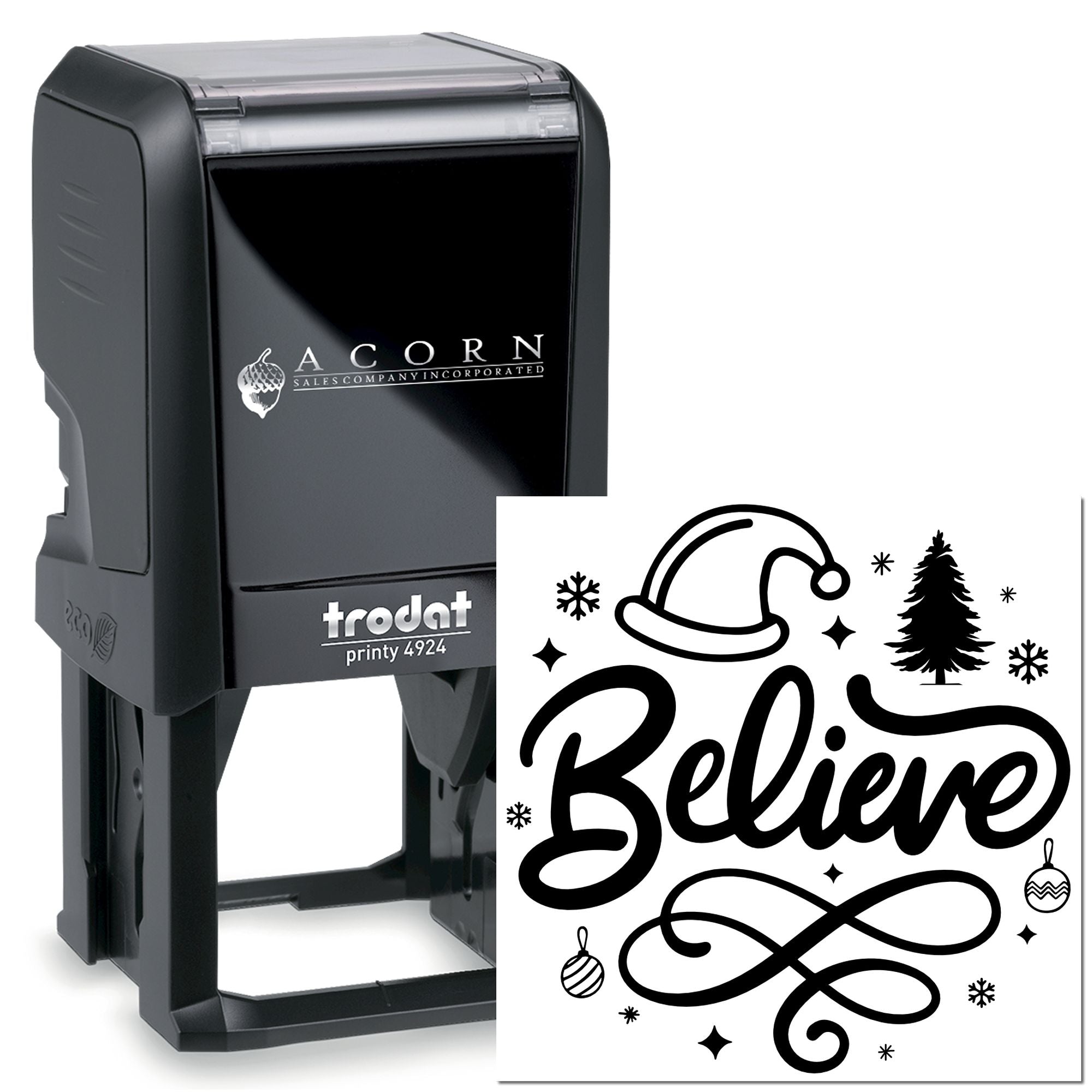 Custom holiday rubber stamp and self-inking Trodat Printy 4924 with Believe design, Santa hat, tree, snowflakes, and ornaments.