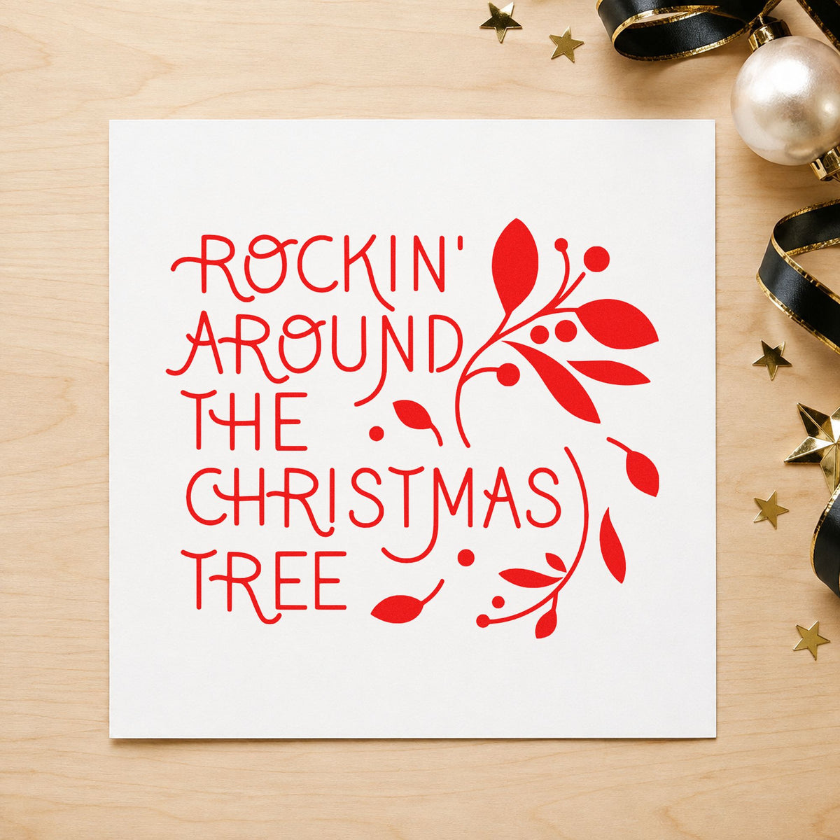 Rockin Around Christmas Tree rubber stamp shown in red ink, stamped for projects such as speaker case labels.