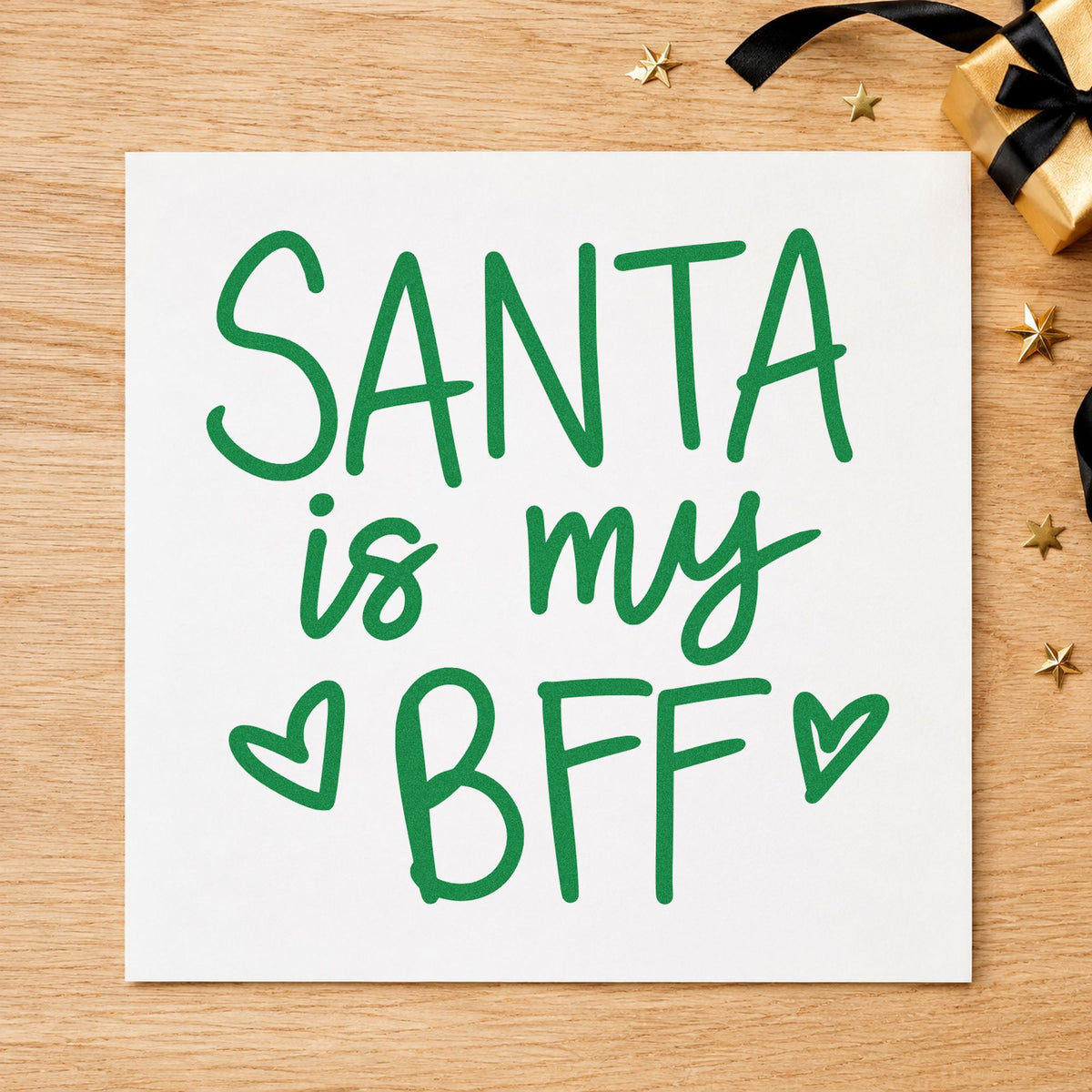 Santa Is My BFF craft stamp imprint in green ink on a handmade project, one idea being friend swap gift tags.