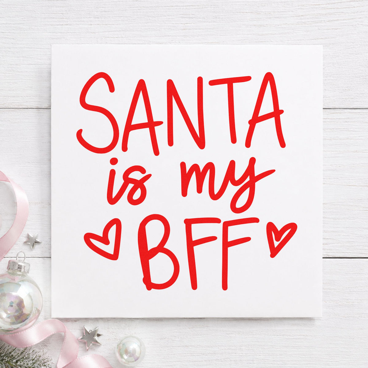 Santa Is My BFF craft stamp in red ink on cardstock, an easy option for hoodie pocket ink.