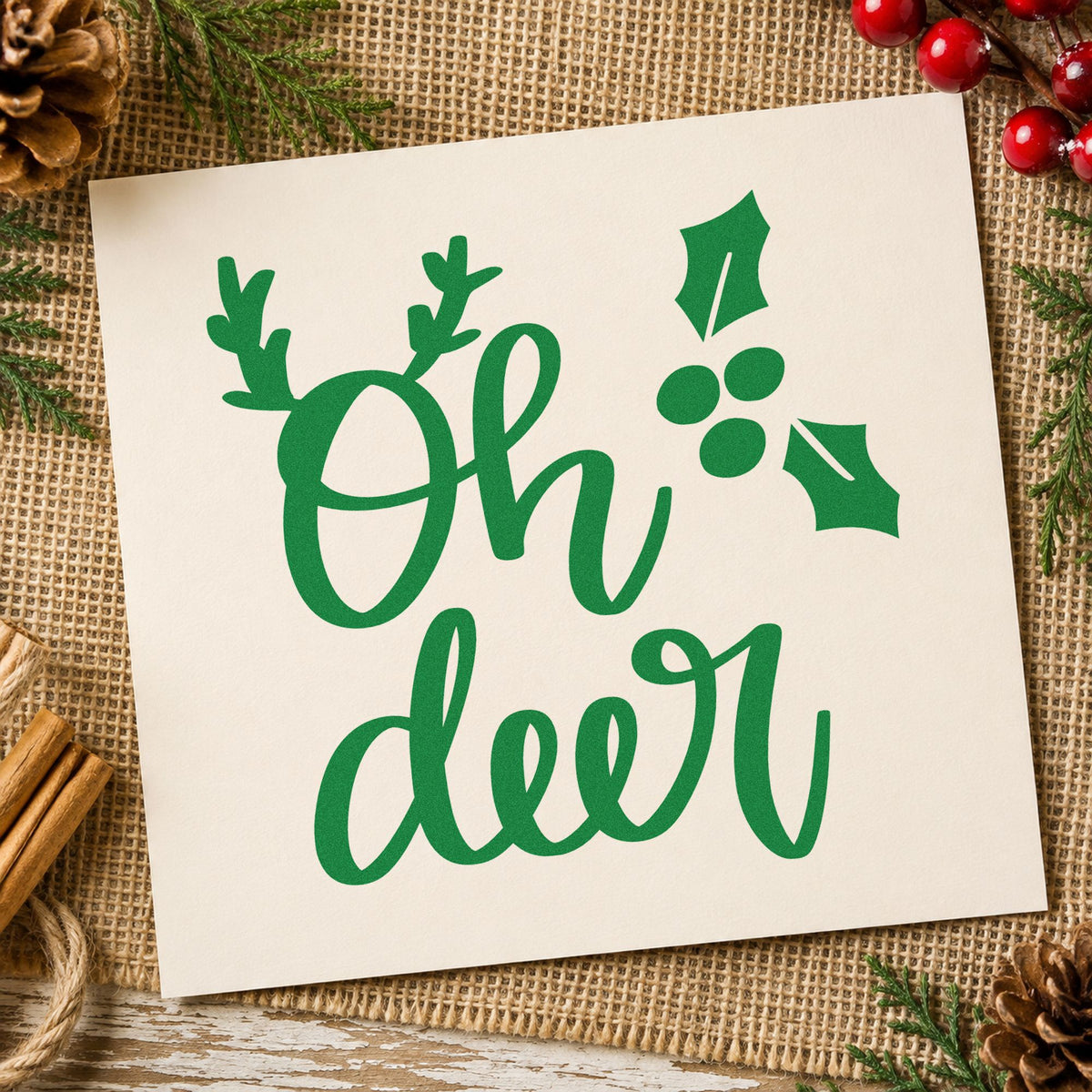Oh Deer Antlers Holly craft stamp imprinted in green ink on paper, a design suited to framed lodge beam.
