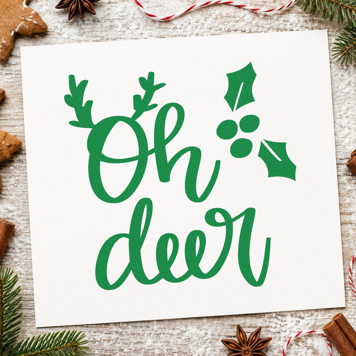 Oh Deer Antlers Holly craft stamp imprint in green ink on a handmade project, one idea being season opener invites.