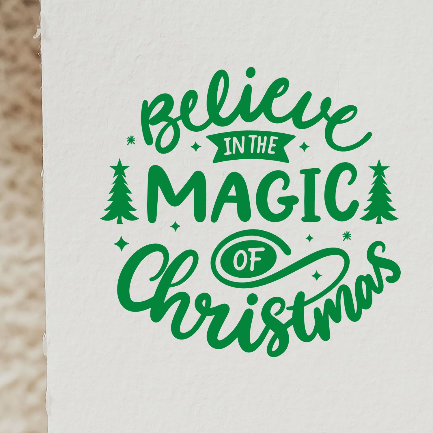 Christmas rubber stamp design with Believe in the Magic of Christmas for festive holiday cards and crafts.
