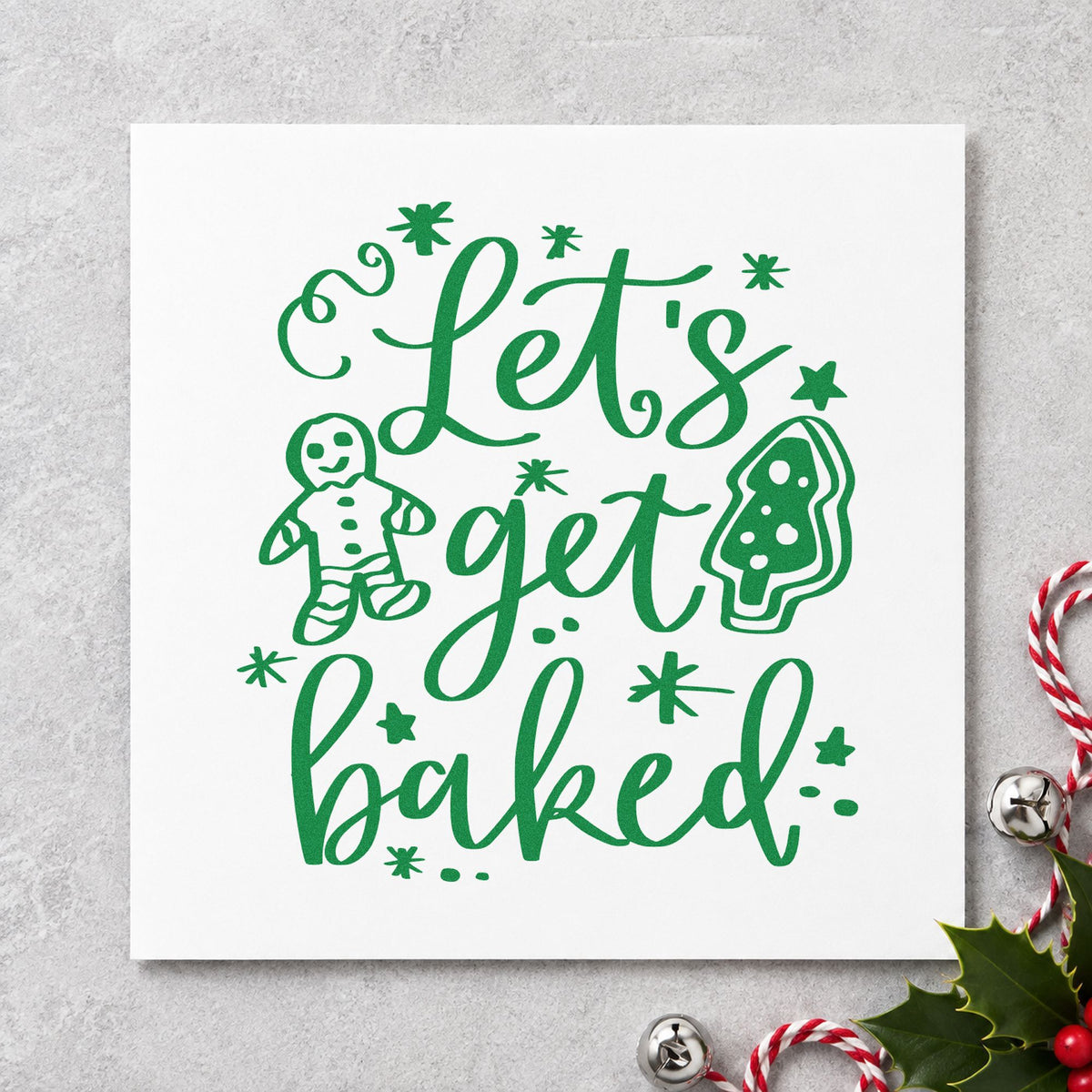 Let's Get Baked Cookies craft stamp imprint in green ink on a handmade project, one idea being swap table placards.